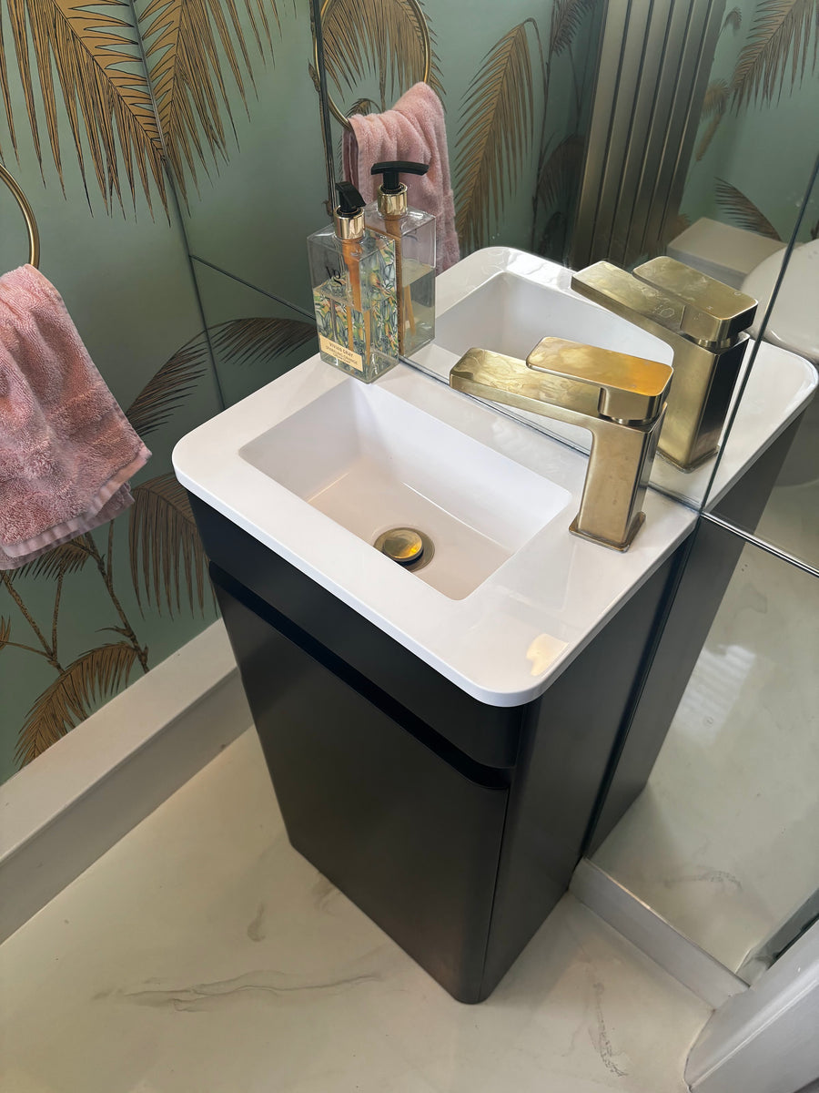 Black & gold cloakroom — Preston Plumbing Services