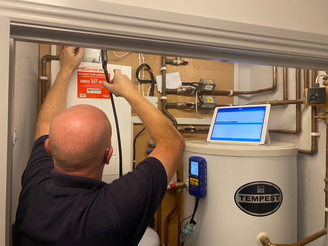 Gas Safe engineer carrying out boiler checks in Preston